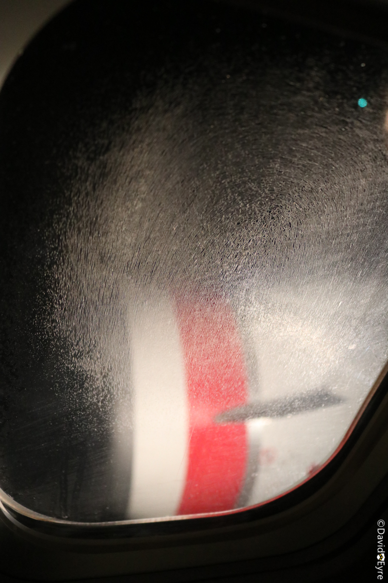 Crazed windows drive me crazy! View from seat 8F aboard VH-VOK Boeing ...